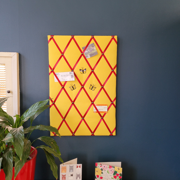 Notice Board - Yellow with Red Ribbons